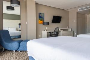 Postel nebo postele na pokoji v ubytování Holiday Inn Express Pachuca by IHG