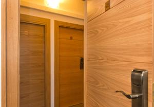 a door that is open in a room at Estudios Aránzazu in Santander