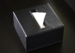 a black box with a white candle in it at APA Hotel Yodoyabashi Kitahama Ekimae in Osaka