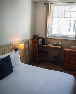 Postel nebo postele na pokoji v ubytování Burlington Guest House