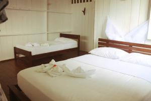 Choibana Ecolodge客房内的一张或多张床位