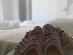 Postel nebo postele na pokoji v ubytování Elia