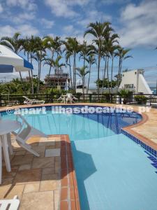 Bazén v ubytování Apto Cond Ilhas do Caribe - Pr - Beira Mar nebo v jeho okolí