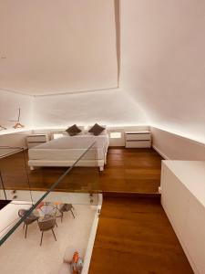 Posteľ alebo postele v izbe v ubytovaní Glorizio Loft Tropea