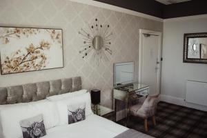 Postel nebo postele na pokoji v ubytování Burlington Guest House