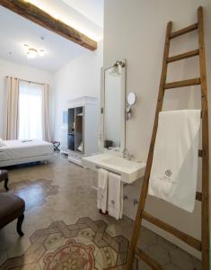 Postel nebo postele na pokoji v ubytování Hotel Madinat