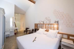 Postel nebo postele na pokoji v ubytování Hotel Madinat