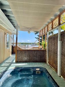 a hot tub on the patio of a house at Turtle Beach Resort in Siesta Key