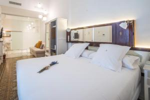 Postel nebo postele na pokoji v ubytování Hotel Madinat