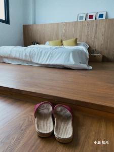 Postel nebo postele na pokoji v ubytování 小島拾光 宜蘭田間包棟民宿Taiwan Yilan Private Villa Paddy view with tranquil & chill vibes