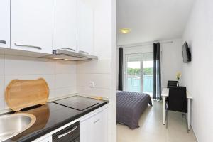 Kuchyň nebo kuchyňský kout v ubytování Apartments Dado Trogir