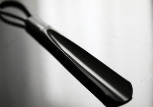 a pair of black handles on a white surface at APA Hotel Yodoyabashi Kitahama Ekimae in Osaka