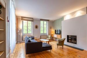 O zonă de relaxare la Faubourg furnished house
