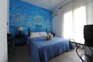 Voodi või voodid majutusasutuse Thalassa Hotel toas