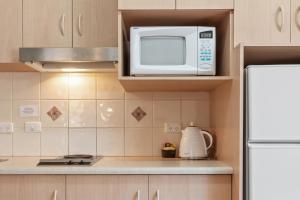 Kuchyň nebo kuchyňský kout v ubytování Taft Apartments