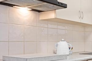 Kuchyň nebo kuchyňský kout v ubytování Taft Apartments