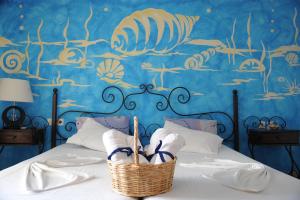 Voodi või voodid majutusasutuse Thalassa Hotel toas