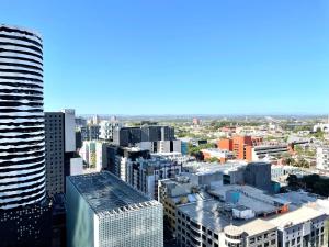 an aerial view of a city with tall buildings at Readyset Apartments at Verve in Melbourne