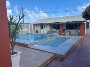 Bazén v ubytování Curasita Colour Appartments & Resort - adres kaya Sucre nst 282 nebo v jeho okolí