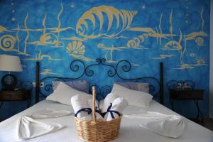 Voodi või voodid majutusasutuse Thalassa Hotel toas