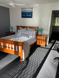 Katil atau katil-katil dalam bilik di Villa 39 Beachfront