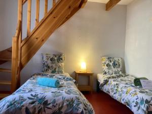 Postel nebo postele na pokoji v ubytování Gîte de Llo - 16 Chambres privées - PDJ inclus