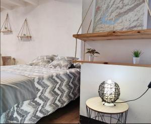 Posteľ alebo postele v izbe v ubytovaní Apartament CORBATERA CIM apartaments