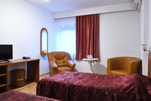 TV a/nebo společenská místnost v ubytování Hotel Select