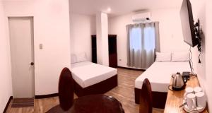 Postel nebo postele na pokoji v ubytování Kampotel Davao