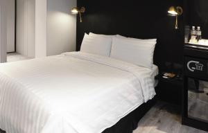 Katil atau katil-katil dalam bilik di Hotel Relax III