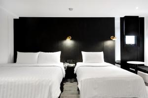Katil atau katil-katil dalam bilik di Hotel Relax III