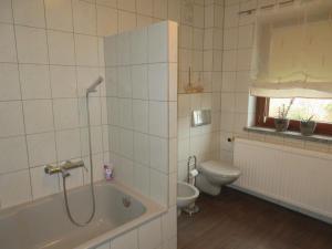 Ένα μπάνιο στο Ferienhaus Waldblick