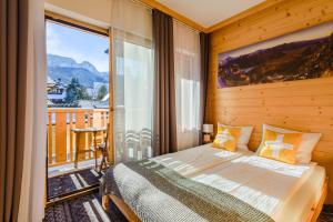 Posteľ alebo postele v izbe v ubytovaní Tamok Lifestyle Villa