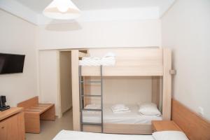 Postel nebo postele na pokoji v ubytování Tosca Beach Hotel