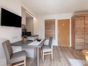 Telewizja i/lub zestaw kina domowego w obiekcie Living-Apart Anita
