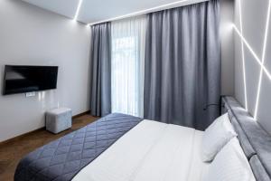 Postel nebo postele na pokoji v ubytování OTAMAN Resort