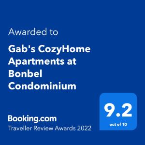 a screenshot of a cell phone with the text awarded to gaedias cozy home at Gab's CozyHome at Bonbel Condo, Botanical Gardens Baguio in Baguio