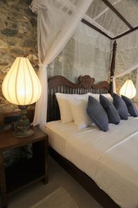 Tempat tidur dalam kamar di Stone Cottage