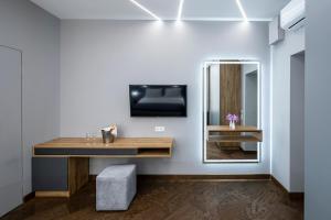 TV a/nebo společenská místnost v ubytování OTAMAN Resort