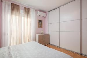 Posteľ alebo postele v izbe v ubytovaní Exclusive Center Apartments