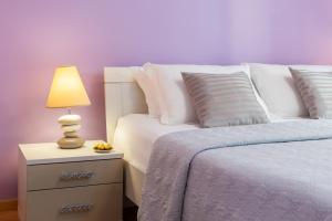 Posteľ alebo postele v izbe v ubytovaní Exclusive Center Apartments