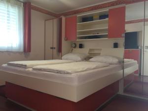 Кровать или кровати в номере Apartment Casa Wiro
