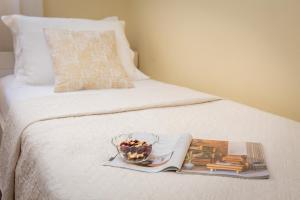 Posteľ alebo postele v izbe v ubytovaní Exclusive Center Apartments