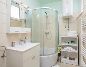 Kúpeľňa v ubytovaní Exclusive Center Apartments + 35 fotografií