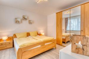 Postel nebo postele na pokoji v ubytování Ferienhaus Waldrose