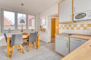 Kuchyň nebo kuchyňský kout v ubytování Ferienhaus Waldrose + 23 fotografií