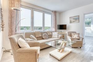 Posezení v ubytování Ferienhaus Waldrose