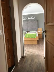 Postel nebo postele na pokoji v ubytování Comfort Hotel Garni Landhaus Gitti