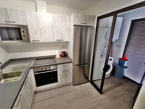 A kitchen or kitchenette at Ap MAJORERO CALETA