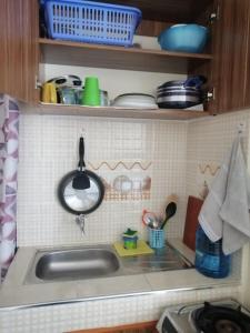 Kuchyň nebo kuchyňský kout v ubytování Lux Suites Sperian Studios Ruiru